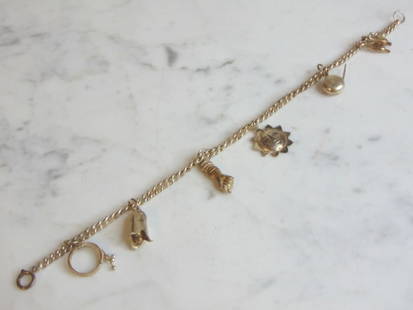 Womens Sterlng Silver Charm Bracelet: FOR SALE IS THIS LOVELY WOMENS VINTAGE ESTATE STERLING SILVER CHARM BRACELET. THE TOTAL WEIGHT IS 15.6g. THE BRACELET MEASURES 8 3/4" LONG BY 1/4"WIDE. ANY QUESTIONS PLEASE DO NOT HESITATE TO