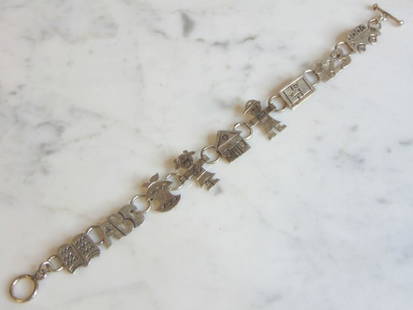 Womens Vintage Estate Sterling Silver School Bracelet: FOR SALE IS A LOVELY VINTAGE ESTATE STERLING SILVER SCHOOL BRACELET. BRACELET MEASURES 7 5/8" LONG BY 3/4" WIDE AND WEIGHS 13.8g. THIS WOULD MAKE A LOVELY GIFT FOR THAT SOMEONE SPECIAL. ANY QUESTIONS,