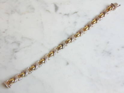 Womens Vintage Estate Sterling Silver Gold Tone Modernist Bracelet: A WOMENS VINTAGE ESTATE STERLING SILVER GOLD TONE MODERNIST BRACELET. BRACELET MEASURES 7" LONG BY 1/4" WIDE AND WEIGHS 14.0g. THIS WOULD MAKE A LOVELY GIFT FOR THAT SOMEONE SPECIAL. ANY