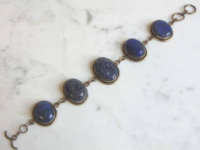 Womens Vintage Sterling Silver Lapis Lazuli Bracelet: FOR SALE IS A LOVELY VINTAGE ESTATE .925 STERLING SILVER LAPIS LAZULI BRACELET. NOT SURE IF STONE IS REAL OR MAN MADE. BRACELET MEASURES 7 5/8" LONG BY 1" WIDE AND WEIGHS 29g. THIS WOULD MAKE A