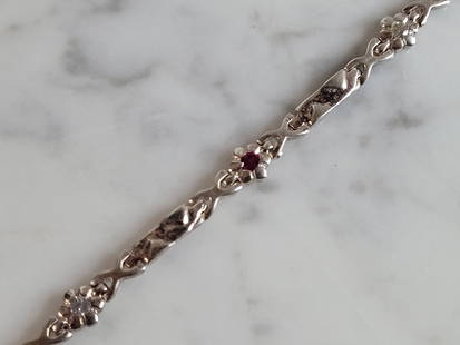 Womens Vintage Estate Sterling Silver Garnet CZ Bracelet: A WOMENS VINTAGE ESTATE STERLING SILVER GARNET & CZ BRACELET. BRACELET MEASURES 7 1/2" LONG BY 1/4" WIDE AND WEIGHS 7.9g. THIS WOULD MAKE A LOVELY GIFT FOR THAT SOMEONE SPECIAL. ANY QUESTIONS,