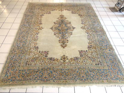 Vintage Estate Decorative Handmade Middle Eastern Rug: A BEAUTIFUL VINTAGE ESTATE DECORATIVE HANDMADE MIDDLE EASTERN RUG THAT MEASURES 8' 10" BY 11' 9" . RUG IS MADE FROM 100% WOOL. RUG HAS SMALL STAINS AS SEEN IN THE PICTURES, WOULD BE BUYING AS IS.