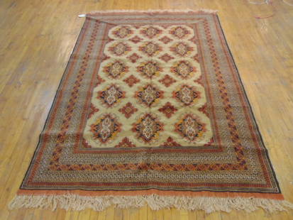 Vintage Estate Semi-Antique Handmade Rug: A BEAUTIFUL SEMI ANTIQUE HAND MADE HAND KNOTTED BOKAHRA RUG THAT MEASURES 9'9"BY 6'6". RUG IS MADE FROM 100% WOOL. CONDITION IS GOOD SHIPPING AND HANDLING IS $75 WITHIN THE CONTINENTAL U.S., ALL OUR