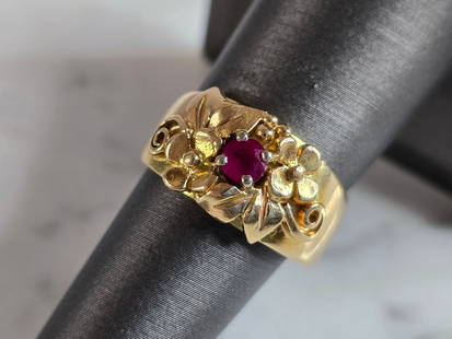 Womens Vintage Estate 14k Yellow Gold Ruby Ring: A WOMENS VINTAGE ESTATE 14K GOLD RUBY & DIAMOND RING. RING IS MARKED ON THE INSIDE "14K". THE SIZE OF THE RING IS A 7.0, AND WEIGHS 8.0g. THERE ARE ABOUT .15cts OF DIAMONDS. THE WIDTH OF THE RING IS 7