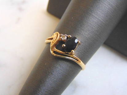 Womens 10K Gold Sapphire w/ Diamond Town & Country Ring: FOR SALE IS THIS VINTAGE ESTATE 10K GOLD SAPPHIRE & DIAMOND RING. THE RING IS A SIZE 5.75 AND WEIGHS 1.4g. NOT SURE IF THE SAPPHIRE IS REAL OR MAN MADE, THE DIAMOND IS REAL. THE RING IS STAMPED " 10K,
