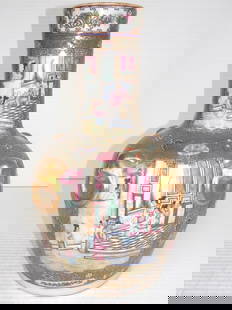 HAND PAINTED CHINESE PORCELAIN ROSE MEDALLION VASE: HAND PAINTED CHINESE ROSE MEDALLION VASE WITH GOLD OVERLAY AND FOO DOG RINGS BY WAH TUNG STANDS 17 1/4 INCHES TALL AND MEASURES 10 INCHES IN DIAMETER. Wah Tung Porcelain: Wah Tung has specialized in m