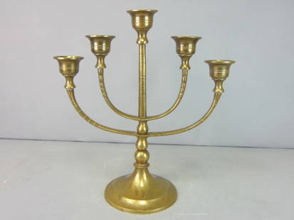 Vintage Decorative Five Candle Brass Candelabra: A VINTAGE DECORATIVE FIVE CANDLE BRASS CANDELABRA THAT MEASURES 9 3/4" TALL BY 9 1/8" LONG. CANDELABRA IS STAMPED CHINA. CANDELABRA WOULD BE A GREAT ADDIDTION TO ANY OFFICE OR ROOM. ANY QUESTIONS PLEA