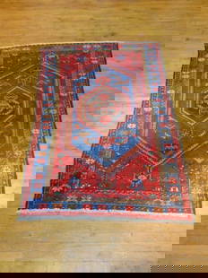 SEMI ANTIQUE HANDMADE WOOL PERSIAN QASHQAI AREA RUG: A BEAUTIFUL SEMI ANTIQUE HANDMADE PERSIAN QASHQAI AREA RUG THAT IS MADE OF 100% WOOL. RUG MEASURES ABOUT 6'9" BY 4'4". AS YOU MAY BE ABLE TO SEE THE RUG IS A LITTLE DISPROPORTIONATE. ONE END MEASURES