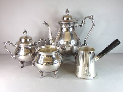 Antique Shridan Silver Plated Tea/Coffee Set: A BEAUTIFUL ANTIQUE SHRIDAN SILVER PLATED TEA/COFFEE SET THAT WAS MADE BY SHERIDAN. THE TEAPOT MEASURES 10 3/4" TALL BY 10 1/2" LONG.THE SUGAR DISH MEASURES 4 1/2" TALL BY ABOUT 4 3/4" WIDE. THE DISH