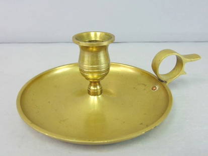 Decorative Vintage Antique Brass Candlestick Holder: A DECORATIVE VINTAGE ANTIQUE BRASS CANDLESTICK HOLDER THAT MEASURES 2 1/2" TALL BY 5 3/4" IN DIAMETER AT THE BASE. ANY QUESTIONS PLEASE DO NOT HESITATE TO ASK. BE SURE TO CHECK OUT SOME OF OUR OTHER G