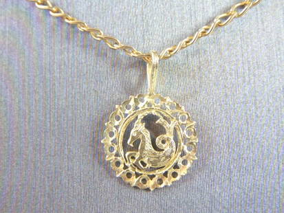 Womens Vintage 14k Gold Necklace w/ Capricorn Pendant: A VINTAGE ESTATE WOMEN'S ITALIAN 14K GOLD CHAIN LINK NECKLACE WITH A "CAPRICORN" PENDANT. THE NECKLACE MEASURES 20 1/2" LONG FROM THE CLASP AND WEIGHS WITH PENDANT 6.3g. THE PENDANT IS 3/4" LONG BY