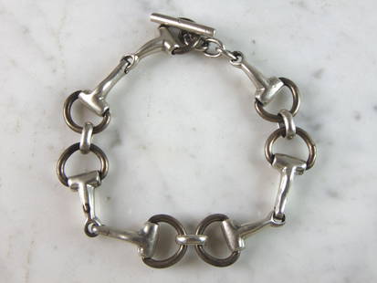 Womens Vintage Estate Sterling Silver Modernist Bracelet: FOR SALE IS A LOVELY WOMENS VINTAGE ESTATE STERLING SILVER MODERNIST BRACELET. BRACELET MEASURES 7 5/8" LONG BY 1/2" WIDE AND WEIGHS 25.9g. THIS WOULD MAKE A LOVELY GIFT FOR THAT SOMEONE