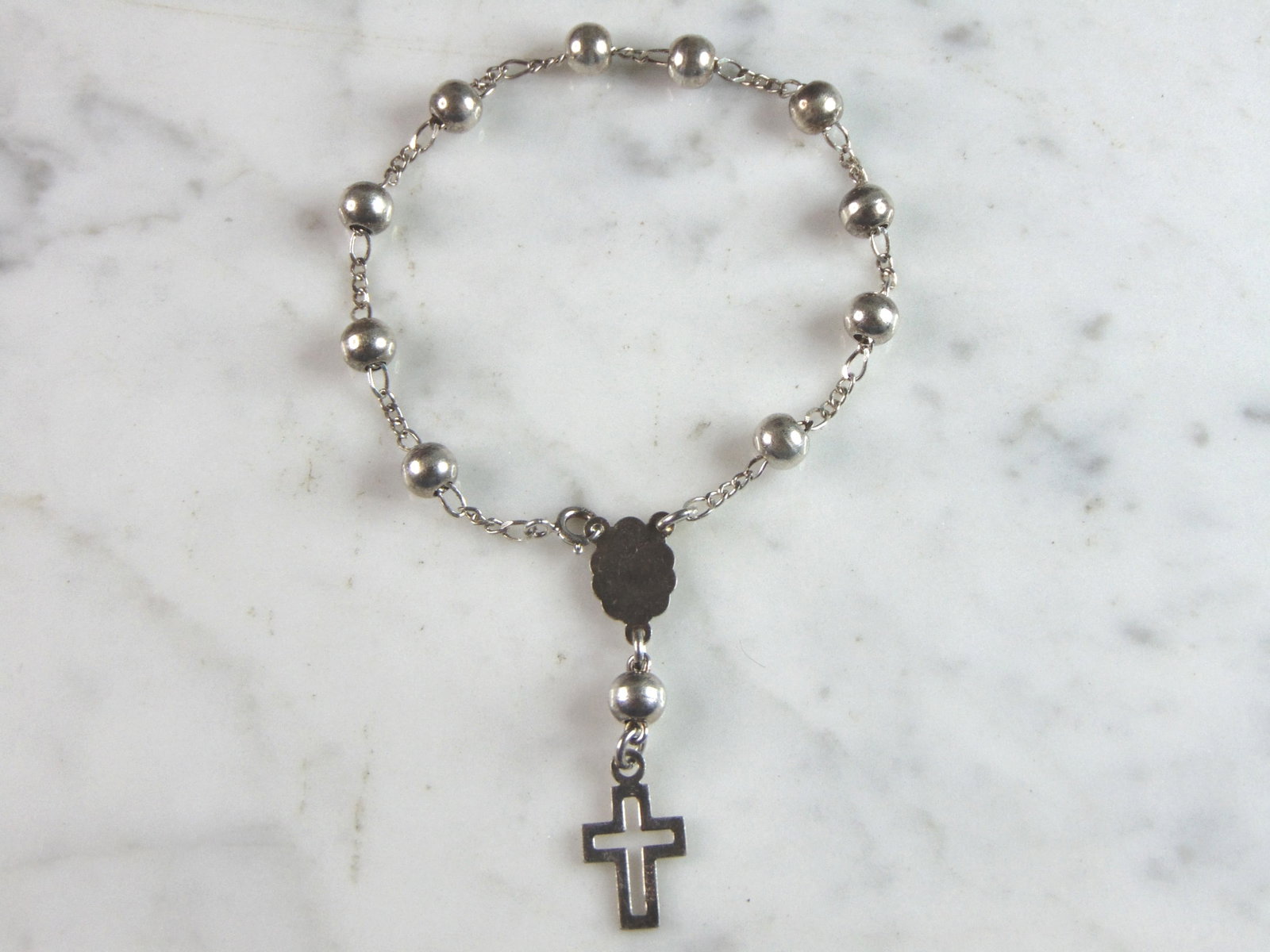 Womens Vintage Estate Sterling Silver Religious Cross Bracelet: FOR SALE IS THIS WOMENS VINTAGE ESTATE STERLING SILVER RELIGIOUS CROSS BRACELET. THE TOTAL WEIGHT IS 6.8g. THE BRACELET MEASURES 7 5/8" LONG BY 1/4" WIDE. MAKES A GREAT GIFT FOR THAT SPECIAL SOMEONE. 