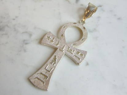 Sterling Silver Egyptian Hieroglyphics Cross Pendant: FOR SALE IS THIS VINTAGE ESTATE .925 STERLING SILVER RELIGIOUS EGYPTIAN HIEROGLYPHICS PENDANT. THE PENDANT WEIGHS 22.7g AND MEASURES 4 1/2" LONG BY 2" WIDE. MAKES A GREAT GIFT FOR THAT SOMEONE SPECIAL
