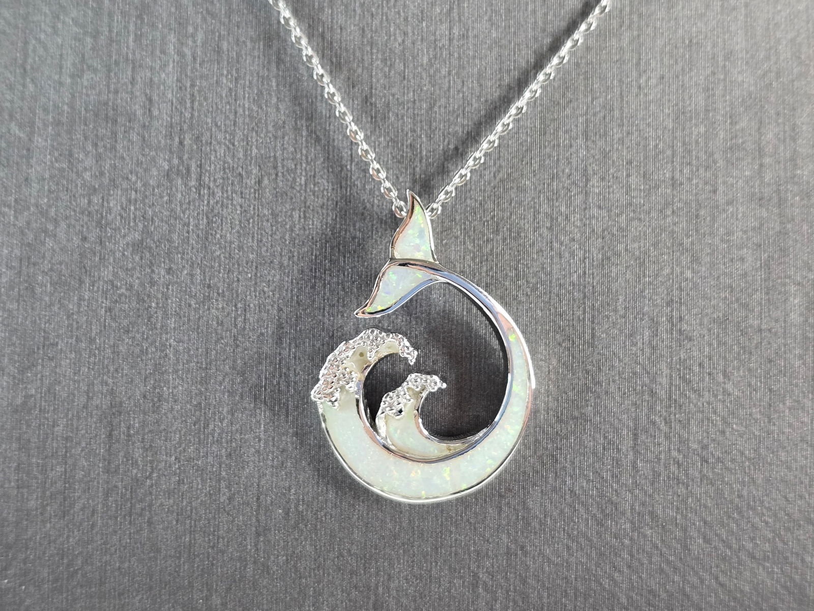 Womens Sterling Silver Opal Modernist Whale Pendant Necklace: A WOMENS STERLING SILVER OPAL MODERNIST WHALE PENDANT WITH NECKLACE. THE PENDANT WITH NECKLACE WEIGHS 5.0g. PENDANT MEASURES 1 1/8" LONG BY 3/4" WIDE, AND THE NECKLACE MEASURES 18" LONG, ADJUSTABLE TO