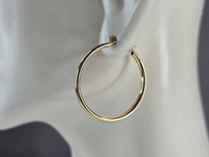 Pr Womens 14K Yellow Gold Hoop Earrings: A PAIR OF WOMENS 14K YELLOW GOLD HOOP EARRINGS. THE EARRINGS WEIGH 1.8g, AND MEASURE 1". EARRINGS ARE MARKED ON THE STEM. THIS MAKES A LOVELY GIFT FOR THAT SOMEONE SPECIAL. ANY QUESTIONS, PLEASE ASK.