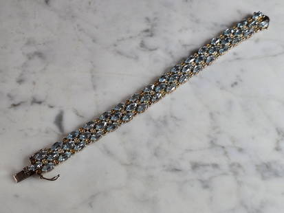Womens Vintage Estate Sterling Silver Topaz Bracelet: A WOMENS VINTAGE WSTATE STERLING SILVER GOLD TONED TOPAZ COLORED BRACELET. NOT SURE IF STONES ARE NATURAL OR MAN MADE. BRACELET MEASURES 7 1/4" LONG BY 1/2" WIDE, AND WEIGHS 38.9g. WOULD MAKE A LOVELY