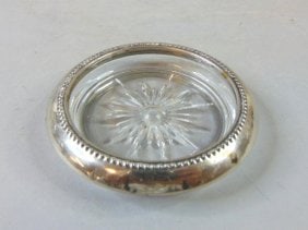 Vintage Decorative Silver Plated Glass Coaster: A VINTAGE DECORATIVE SILVER PLATED GLASS COASTER. COASTER MEASURES 4" IN DIAMETER AND 7/8" TALL. BE SURE TO CHECK OUT SOME OF OUR OTHER GREAT ITEMS UP FOR SALE. THANK YOU. SHIPPING AND HANDLING IS $20
