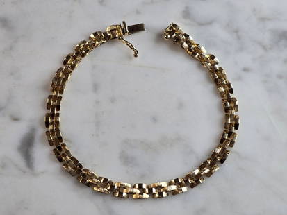 Womens Vintage Estate 14K Yellow Gold Italian Bracelet: A WOMENS VINTAGE ESTATE 14K YELLOW GOLD ITALIAN BRACELET THAT WEIGHS 8.3g. THE BRACELET MEASURES ABOUT 7 3/8" LONG 1/4" WIDE. BRACELET IS MARKED NEAR THE CLASP," 14K, ITALY". ANY QUESTIONS PLEASE ASK.