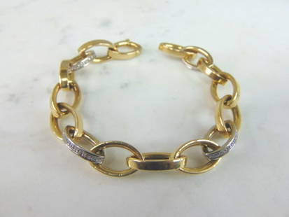 Womens Vintage Estate 14K Gold Diamond Italian Bracelet: A WOMENS VINTAGE ESTATE 14K YELLOW GOLD DIAMOND LINK ITALIAN BRACELET WITH ABOUT 0.56cts OF DIAMONDS. THE BRACELET WEIGHS 21.9g AND MEASURES 8" LONG BY 3/8" WIDE. BRACELET IS MARKED ON THE CLASP. DOES