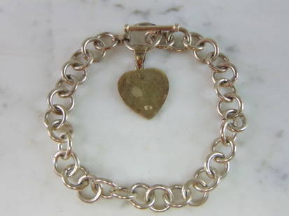 Womens Vintage Sterling Silver Heart Charm Bracelet: FOR SALE IS A LOVELY VINTAGE ESTATE .925 STERLING SILVER HEART CHARM BRACELET. BRACELET MEASURES 8 3/8" LONG BY 3/8" WIDE AND WEIGHS 27.3g. THIS WOULD MAKE A LOVELY GIFT FOR THAT SOMEONE SPECIAL. ANY