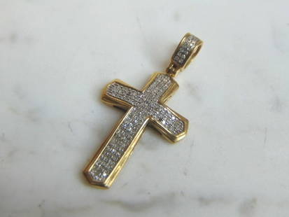 Vintage Estate 10k Yellow Gold Diamond Religious Cross Pendant: A VINTAGE ESTATE 10K YELLOW GOLD CROSS PENDANT WITH DIAMOND CHIPS. PENDANT WEIGHS 2.0g, AND MEASURES 1 1/4" BY 5/8". CROSS IS MISSING ONE TINY DIAMOND. BUYING AS IS. WOULD MAKE A LOVELY GIFT FOR THAT