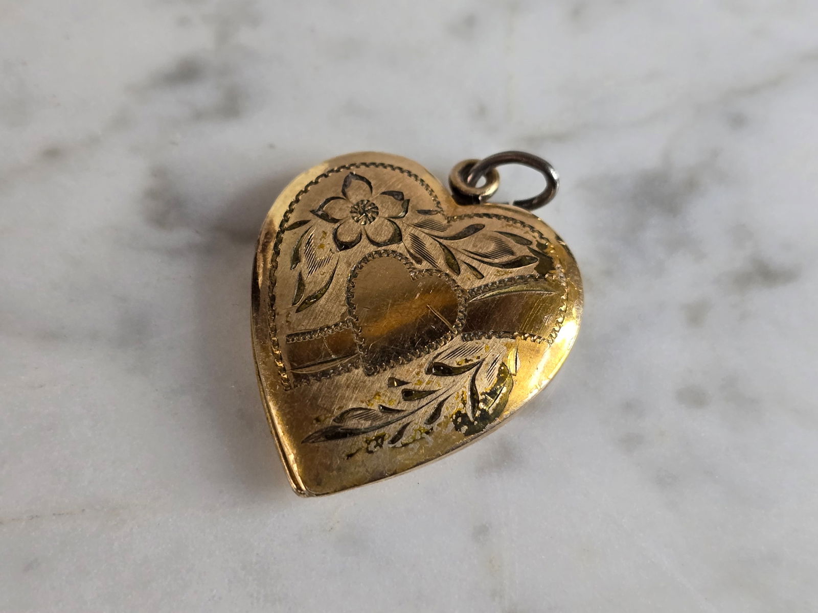 Womens Vintage Estate Sterling Silver Gold Tone Heart Pendant Locket: A WOMENS VINTAGE ESTATE STERLING SILVER HEART PENDANT LOCKET THAT WEIGHS 6.0g. THE PENDANT MEASURES 1 1/4" BY 1". PENDANT IS MARKED "1/20, 10K ON STERLING". ANY QUESTIONS PLEASE DONT HESITATE TO ASK.
