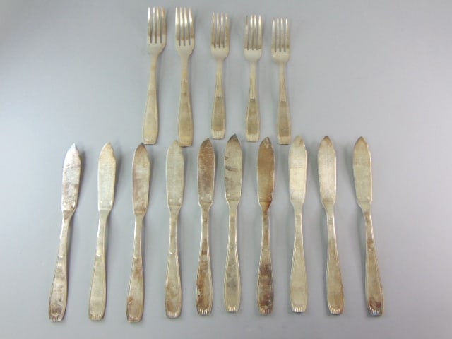 Lot of Silver Plated Fish Knifes & Forks by Christofle: FOR SALE IS THIS LOT OF FRENCH ANTIQUE SILVER PLATED FISH KNIFES & FORKS BY CHRISTOFLE. LOT IS MADE OF 10 FISH KNIFES THAT MEASURE 8 1/8" ON LENGTH AND 2 FORKS THAT MEASURE 7 3/8" IN LENGTH AND 3 FORK