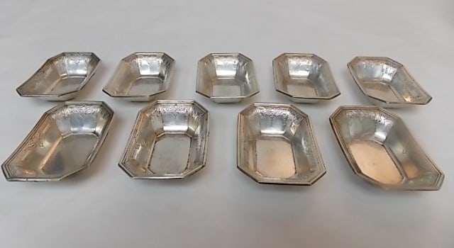 9 ANTIQUE GORHAM STERLING SILVER DISHES: A LOT OF 9 ANTIQUE ART NOUVEAU STERLING SILVER JE CALDWELL DISHES THAT WERE MADE FOR GORHAM . THEY ARE OCTAGON SHAPED NUT DISHES OR SALT NIP DISHES THAT MEASURE 3 3/8" LONG BY 2 1/4" WIDE, BY ABOUT 3/