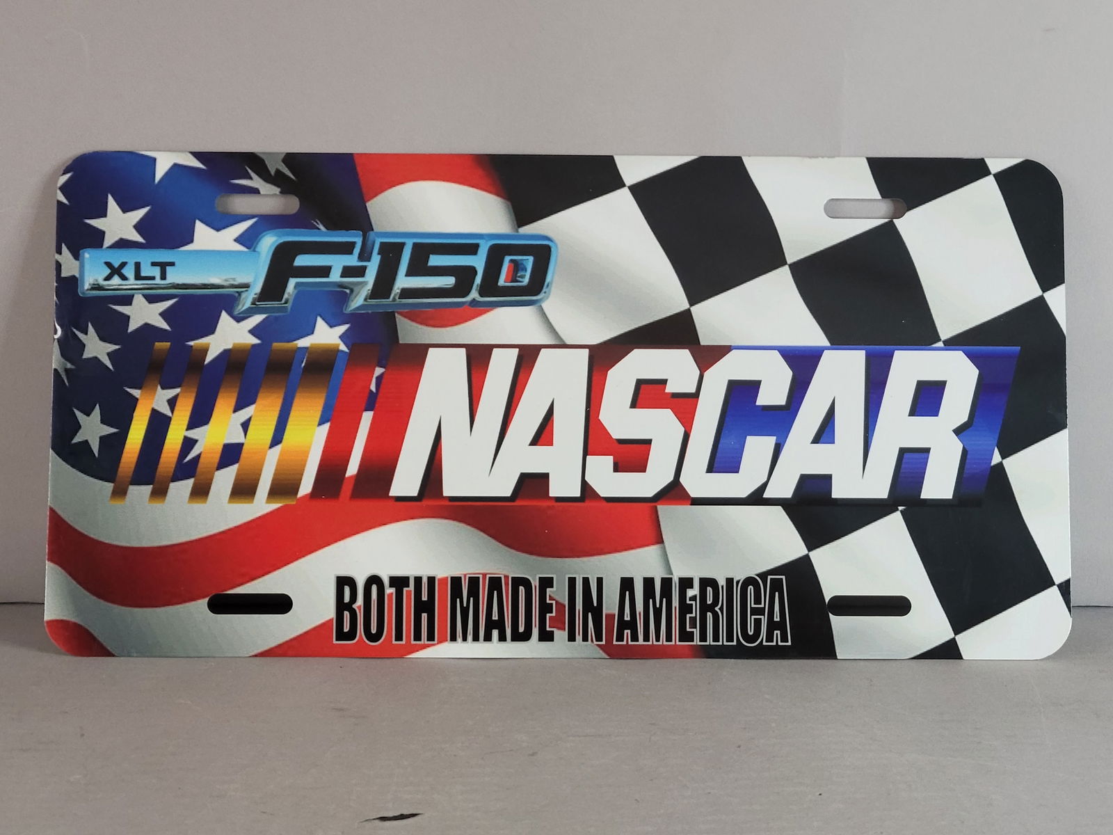 Collectible Ford Truck F150 NASCAR Racing Booster License Plate: New Ford Truck F-150 NASCAR License Plate Made of aluminum. Shipping and handling is $16 within the Continental U.S. All other states and countries please contact for shipping quote.