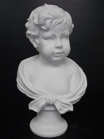 VICTORIAN BUST STATUE OF LITTLE BOY W/ MARBLE FINISH: AN AMAZINGLY DECORATIVE AND HIGH QUALITY VICTORIAN BUST STATUE OF A LITTLE BOY. THE STATUE STANDS 15 1/2" TALL BY 9" WIDE. STATUE IS MADE OF RESIN WITH A MARBLE FINISH. GREAT PIECE TO ADD TO THAT VICT