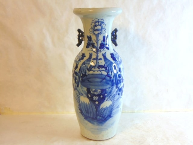 Antique Chinese Celadon Floral Bird Vase: ANTIQUE CHINESE CELADON FLORAL BIRD VASE. VASE STANDS 23 3/4" TALL AND MEASURES APPROXIMATELY 8" WIDE AT THE BASE. CONDITION IS GOOD FOR ITS AGE BUT AS YOU CAN SEE IT DOES HAVE SOME VERY MINOR BLEMISH