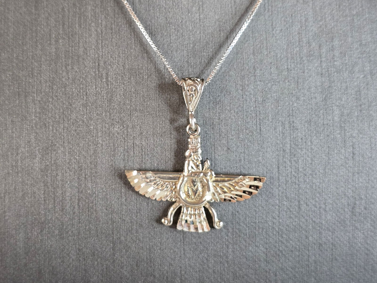 Womens Estate Sterling Silver Arabic Farvahar Pendant Necklace: A WOMENS VINTAGE ESTATE STERLING SILVER ARABIC FARVAHAR PENDANT NECKLACE. THE NECKLACE WITH PENDANT WEIGHS 6.5g. NECKLACE MEASURES 18" LONG. THE PENDANT MEASURES 1 3/8" BY 1 1/4". MAKES A GREAT GIFT F