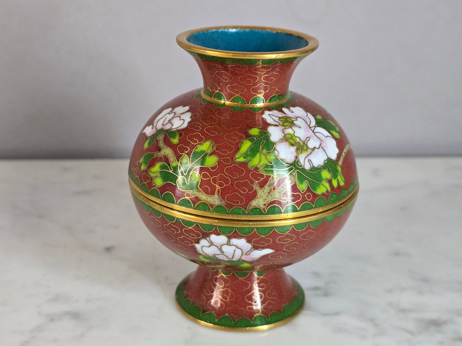 VINTAGE CLOISONNE MINI RICE WARMER: UP FOR SALE IS THIS NICE DECORATIVE CHINESE CLOISONNE MINIATURE RICE WARMER WITH TREE BLOSSOM MOTIF STANDS 3 1/4" TALL. NICE LITTLE DECORATORS PIECE. PIECE WAS TESTED BY U.S. CUSTOMS AND FOUND TOUCHES