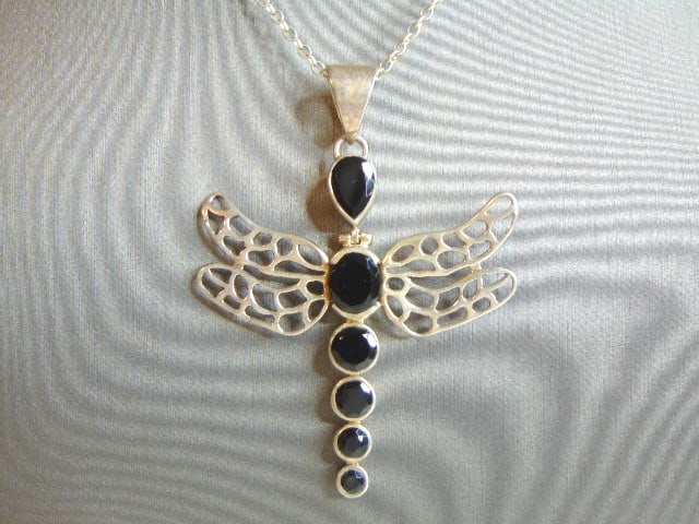 Womens Sterling Silver Necklace W/ Dragonfly Pendant: FOR SALE IS THIS VINTAGE ESTATE STERLING SILVER NECKLACE WITH A ONYX STONE DRAGONFLY PENDANT. NOT SURE IF STONES ARE REAL OR MAN MADE. TOGETHER THEY WEIGH 14.8g. NECKLACE MEASURES 18", PENDANT MEASURE