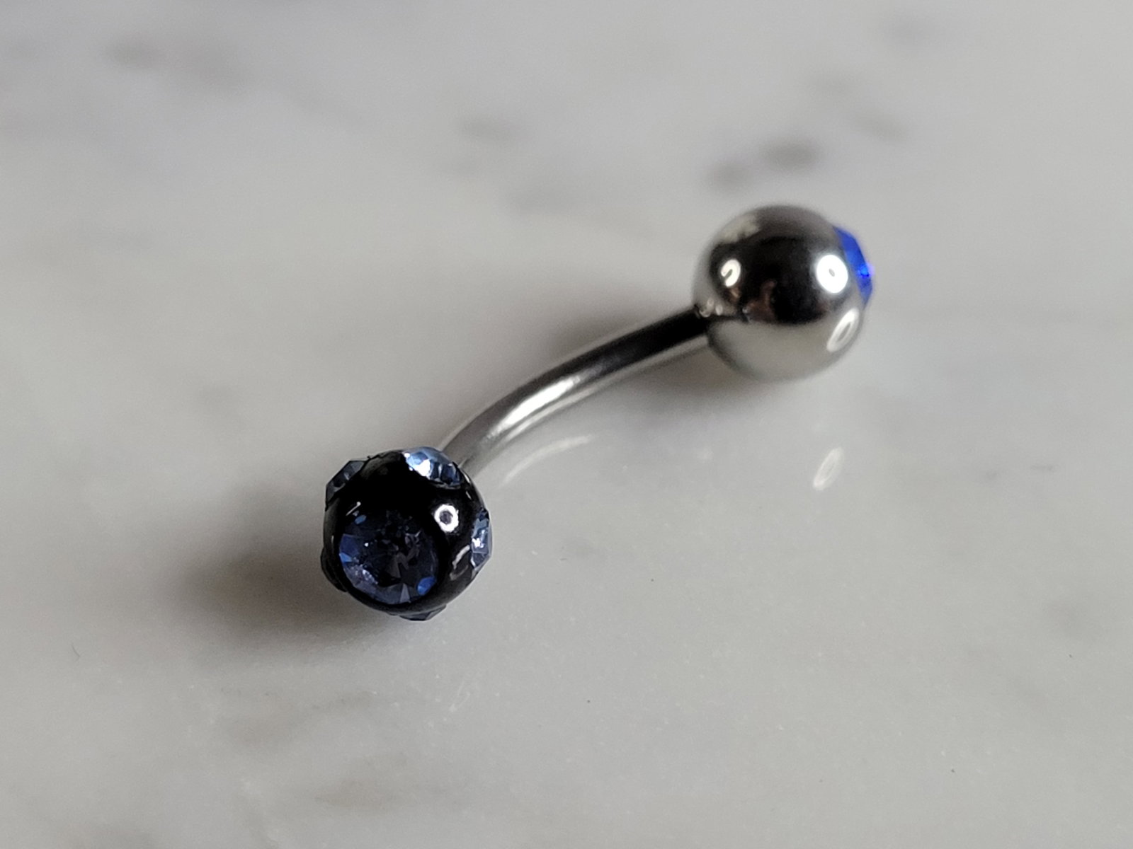New Surgical Jeweled Nipple Ear Tongue Piercing Barbell: A NEW BODY PIERCING MADE OF SURGICAL STEEL WITH JEWELED BALLS ON EACH END. PIERCING BAR MEASURES 3/4" LONG. ANY QUESTIONS, PLEASE DON'T HESITATE TO ASK. MAKES AN ATTRACTIVE GIFT FOR THAT SOMEONE SPECI