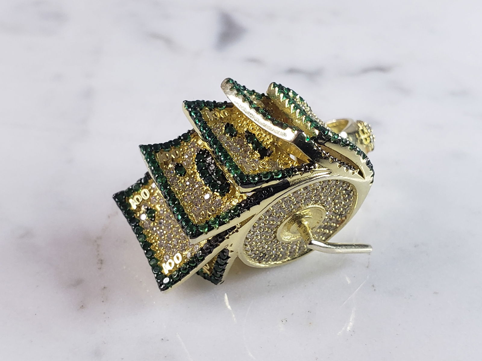 Vintage Estate Sterling Silver Money Wheel Pendant: A VINTAGE ESTATE STERLING SILVER GOLD TONE MONEY WHEEL PENDANT THAT WEIGHS 15.5g. THE PENDANT MEASURES 1 1/2" LONG BY 1/2" WIDE. MARKED 925 ON THE BALE. MAKES A GREAT GIFT FOR THAT SPECIAL SOMEONE. AN