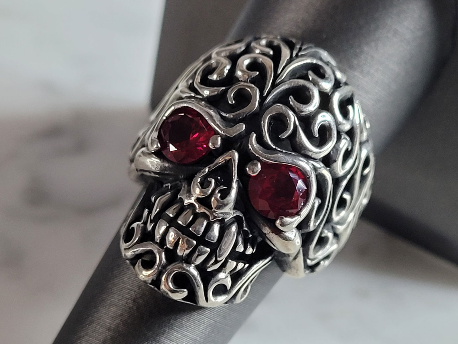 Mens Sterling Silver Ruby Eyed Skull Ring (1 of 5)