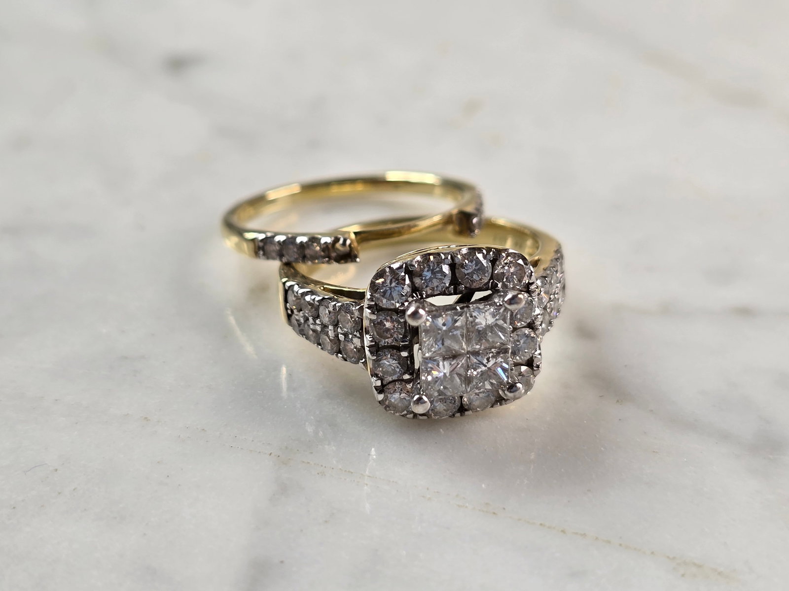 Womens Estate 14k Yellow Gold Lab Diamond Tasha R Ring Set: A WOMENS ESTATE 14K YELLOW GOLD LAB CREATED DIAMOND RING MADE BY "TASHA R". THE RINGS TOGETHER WEIGH 7.1g AND ARE A SIZE 7.0. THE WIDTH OF THE RING IS ABOUT 1/2". THE CENTER DIAMONDS TOTAL ABOUT 0.25c