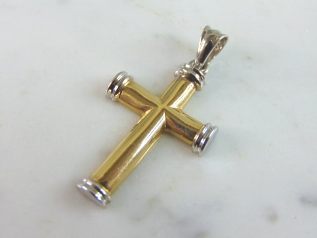 Vintage Estate 14K Gold Religious Cross Pendant: A VINTAGE ESTATE 14K YELLOW & WHITE GOLD RELIGIOUS CROSS PENDANT. THE PENDANT WEIGHS 4.6g AND MEASURES 1 3/8" LONG BY 3/4" WIDE. PIECE IS MARKED 14K ON THE BACK. MAKES A GREAT GIFT FOR THAT SOMEONE SP