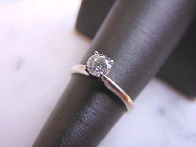 14k White Gold Solitaire .50ct Diamond Ring: FOR SALE IS THIS WONDERFUL WOMEN'S 14K WHITE GOLD RING WITH A BEAUTIFUL .50 CT. ROUND DIAMOND STONE. THE RING WEIGHS 2.0g. THE SIZE OF THE RING IS A 6.0. THE DIAMOND HAS A BEAUTIFUL SPARKLE TO IT, AND