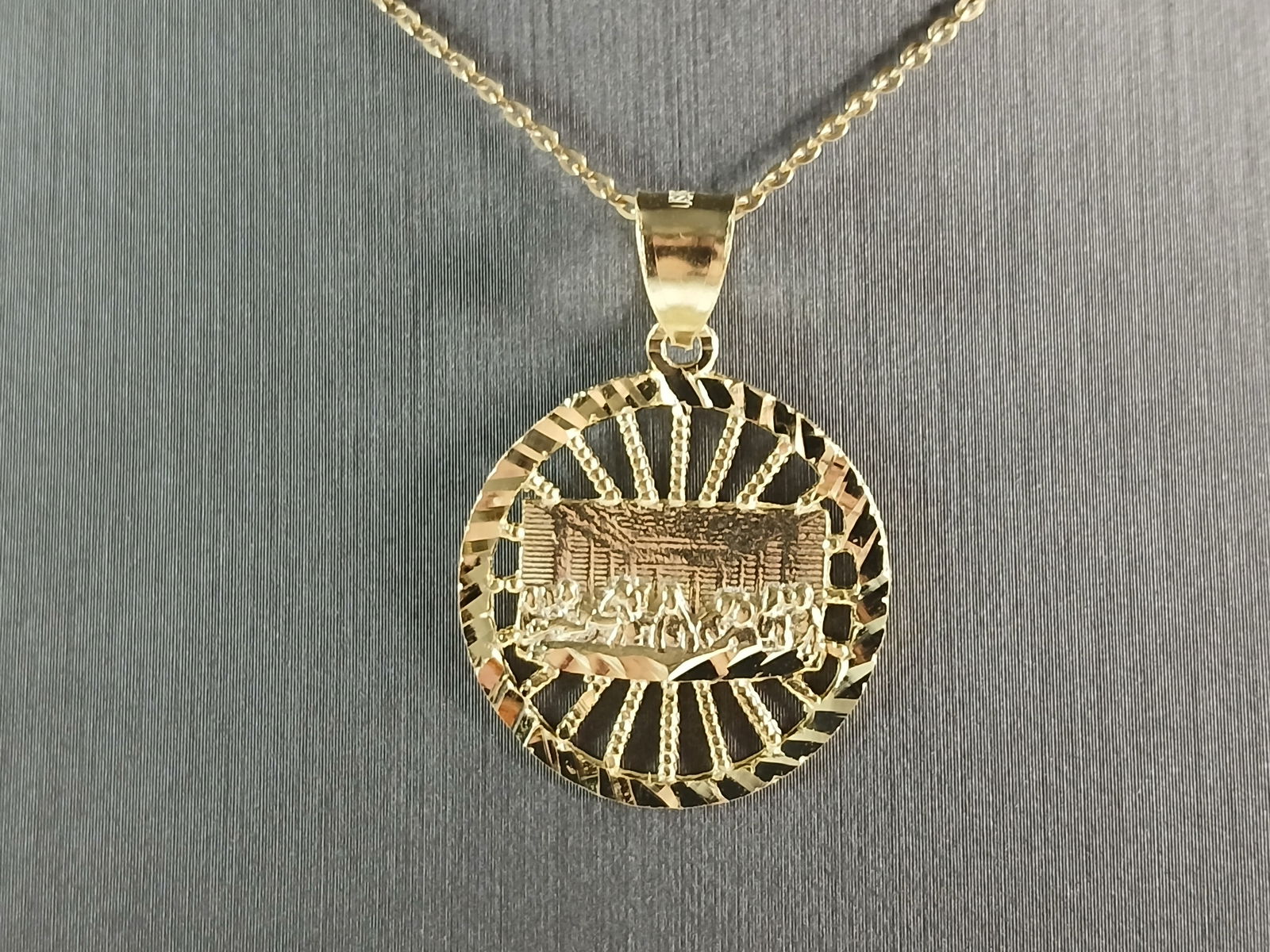 Sterling Silver Gold Tone Religious Last Supper Pendant Necklace: A STERLING SILVER GOLD TONE RELIGIOUS LAST SUPPER PENDANT WITH NECKLACE. PENDANT WITH NECKLACE WEIGHS 3.9g. THE PENDANT MEASURES 1 1/4" LONG BY 7/8" WIDE. THE NECKLACE MEASURES 18" LONG AND IS ADJUSTA