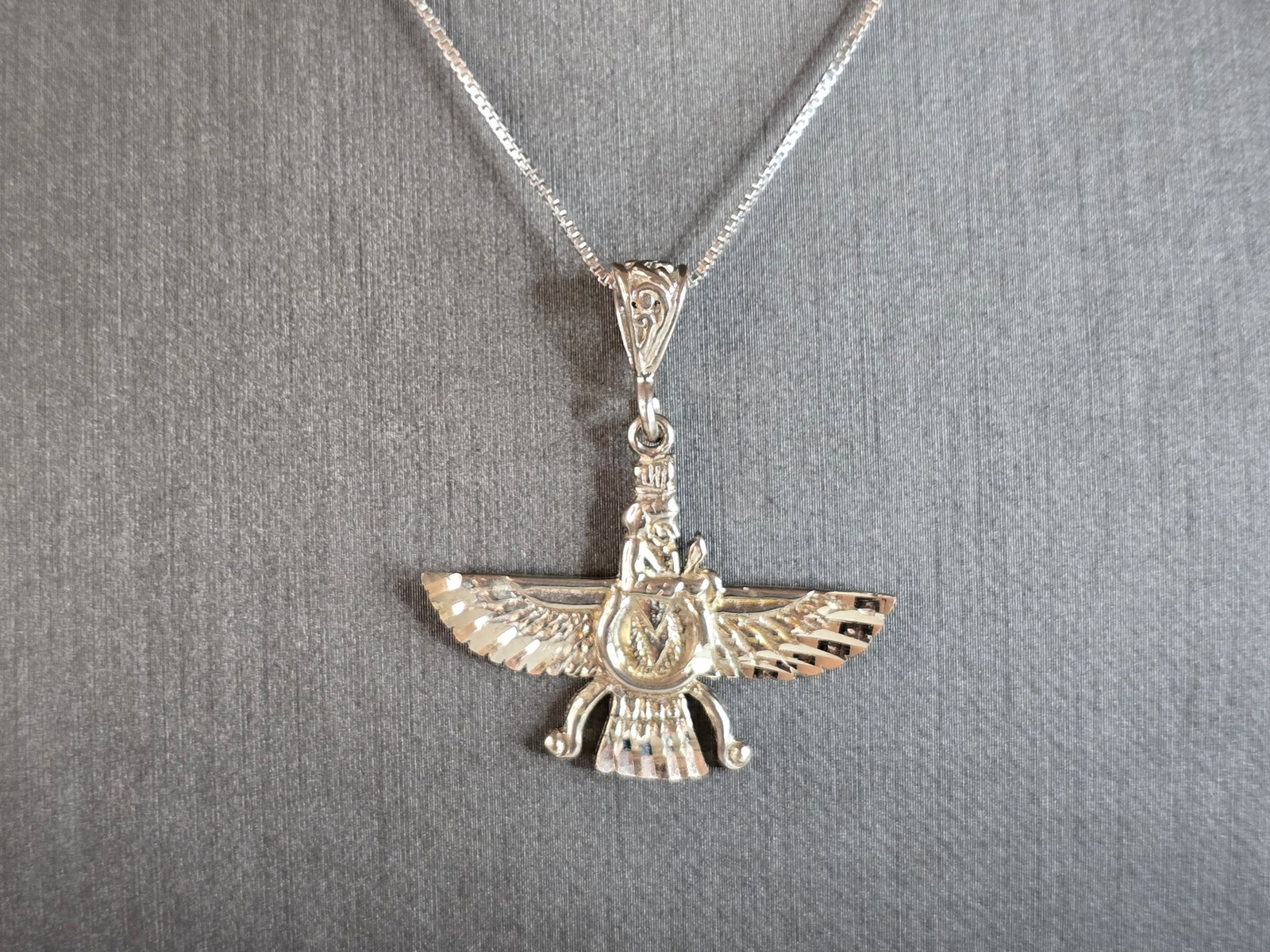 Womens Estate Sterling Silver Persian Farvahar Pendant Necklace: A WOMENS VINTAGE ESTATE STERLING SILVER PERSIAN FARVAHAR PENDANT NECKLACE. THE NECKLACE WITH PENDANT WEIGHS 6.5g. NECKLACE MEASURES 18" LONG. THE PENDANT MEASURES 1 3/8" BY 1 1/4". MAKES A GREAT GIFT