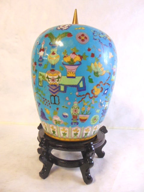 VINTAGE ANTIQUE CHINESE CLOISONNE GINGER JAR: A BEAUTIFUL VINTAGE ANTIQUE CHINESE CLOISONNE GINGER JAR THAT MEASURES ABOUT 13" TALL BY ABOUT 9" AT ITS WIDEST POINT. CONDITION IS VERY NICE BUT THERE IS A BLEMISH THAT APPEARS TO HAVE BEEN MADE AT