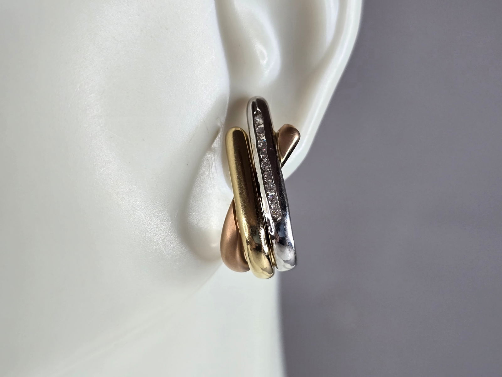 Womens Vintage Estate 14K Multi Gold CZ Stud Earrings: A LOVELY PAIR OF WOMENS 14K YELLOW, WHITE AND ROSE GOLD CZ STUD EARRINGS . THE EARRINGS WEIGH 7.6g, AND MEASURE 3/4" BY 5/16". ANY QUESTIONS, PLEASE DON'T HESITATE TO ASK. BE SURE TO CHECK OUT SOME OF