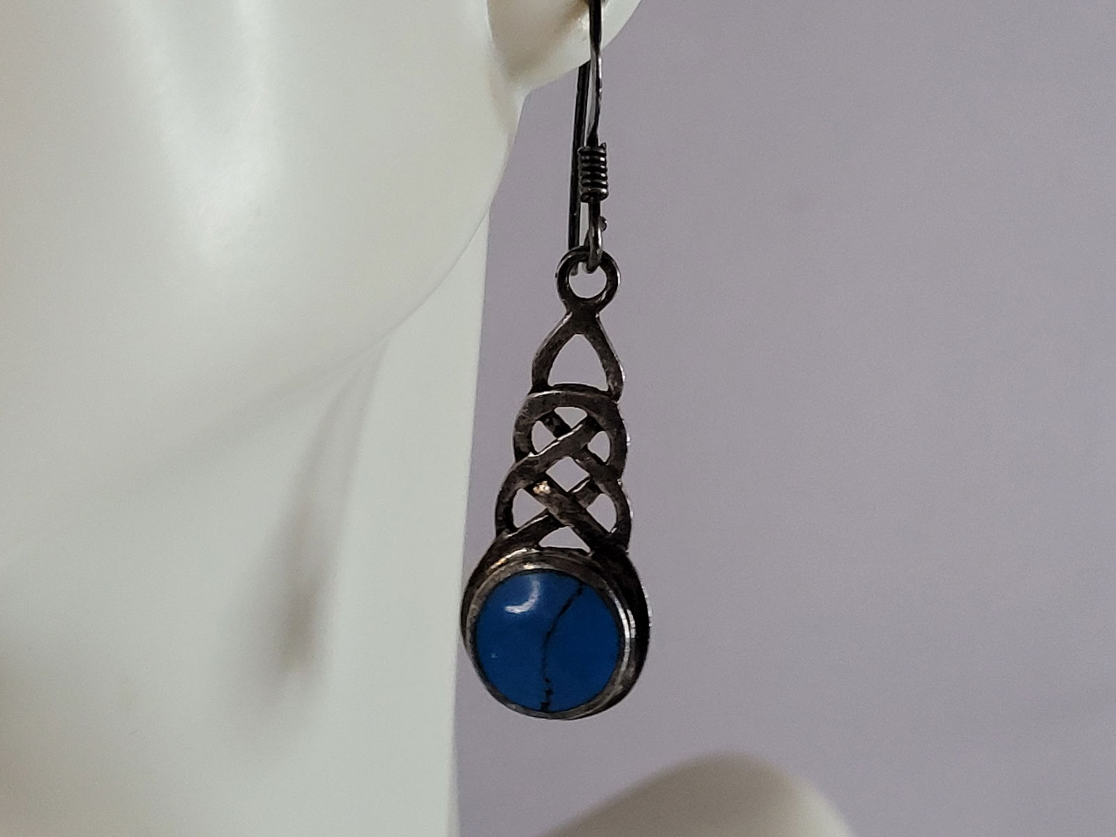 Womens Vintage Estate Sterling Silver Turquoise Dangle Earrings: WOMENS VINTAGE ESTATE STERLING SILVER TURQUOISE EARRINGS THAT WEIGHS 4.0g AND MEASURES 1 1/2" LONG BY 3/8" WIDE. NOT SURE IF STONES ARE NATURAL OR MAN MADE. ANY QUESTIONS, PLEASE DO NOT HESITATE TO AS