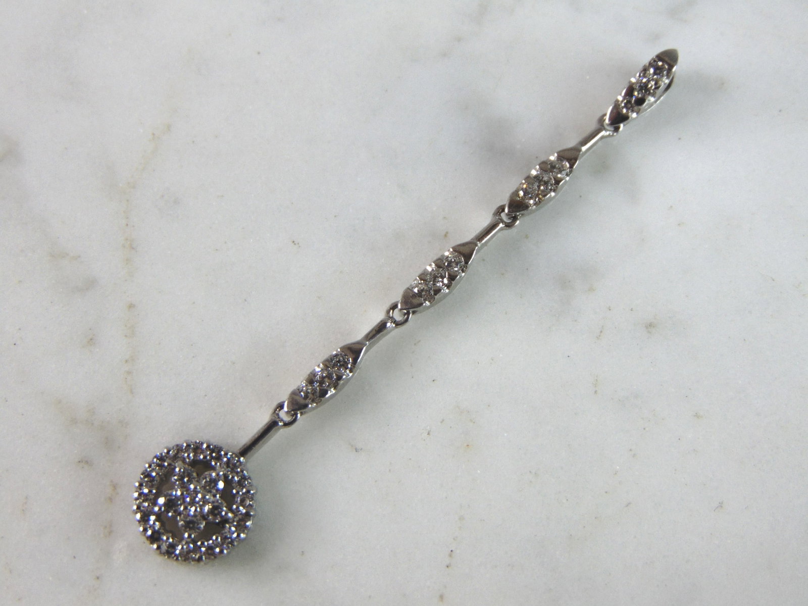 Womens Vintage Estate Sterling Silver CZ Pendant: A WOMENS VINTAGE ESTATE STERLING SILVER CZ PENDANT. PENDANT IS 2" LONG BY 3/8" WIDE, AND WEIGHS 1.8g. THIS WOULD MAKE A LOVELY GIFT FOR THAT SOMEONE SPECIAL. BE SURE TO CHECK OUT SOME OF MY OTHER GREA