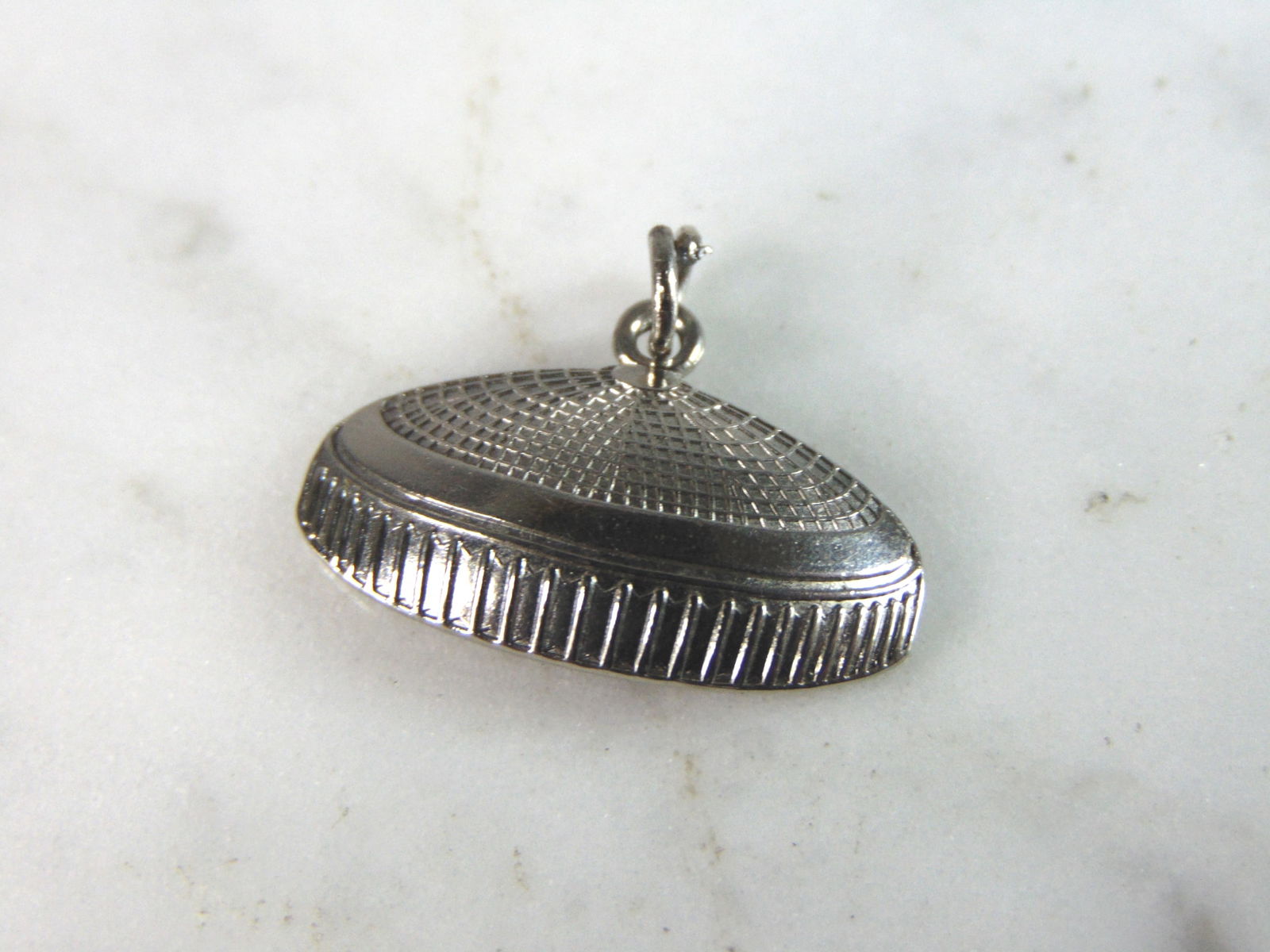 Womens Vintage Estate Sterling Silver The Domed Stadium Charm: FOR SALE IS THIS WOMENS VINTAGE ESTATE STERLING SILVER THE DOMED STADIUM HOUSTON TEXAS CHARM. CHARM WEIGHS 1.8g AND CHARM MEASURES 5/8" LONG BY 7/8" WIDE. MAKES A GREAT GIFT FOR THAT SOMEONE SPECIAL.