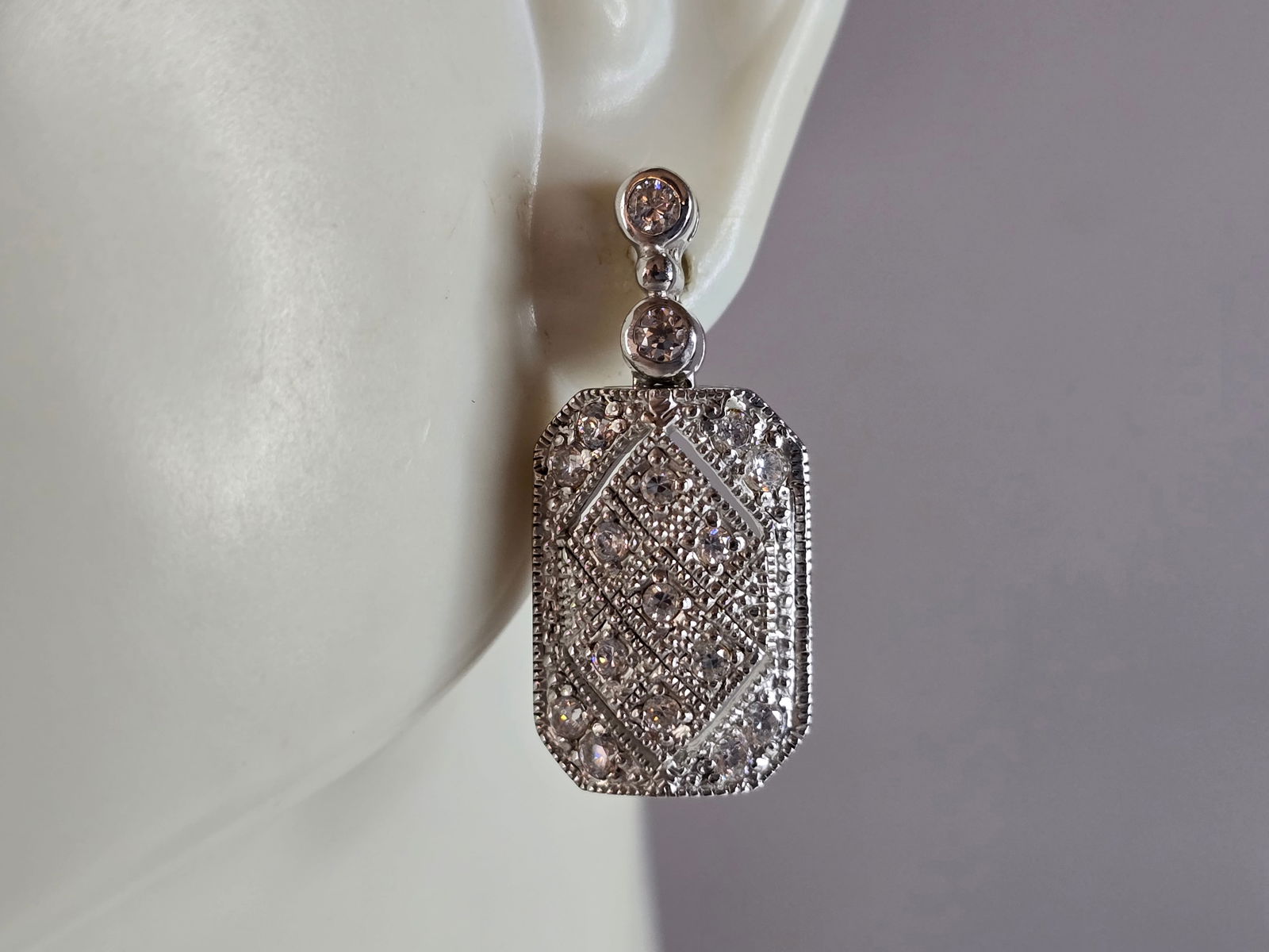 Womens Vintage Estate Sterling Silver Modernist CZ Earrings: A PAIR OF WOMENS STERLING SILVER MODERNIST CZ EARRINGS THAT WEIGH 7.2g AND MEASURE 1" LONG BY 1/2" WIDE. ANY QUESTIONS, PLEASE DO NOT HESITATE TO ASK. BE SURE TO CHECK OUT SOME OF MY OTHER GREAT ITEMS