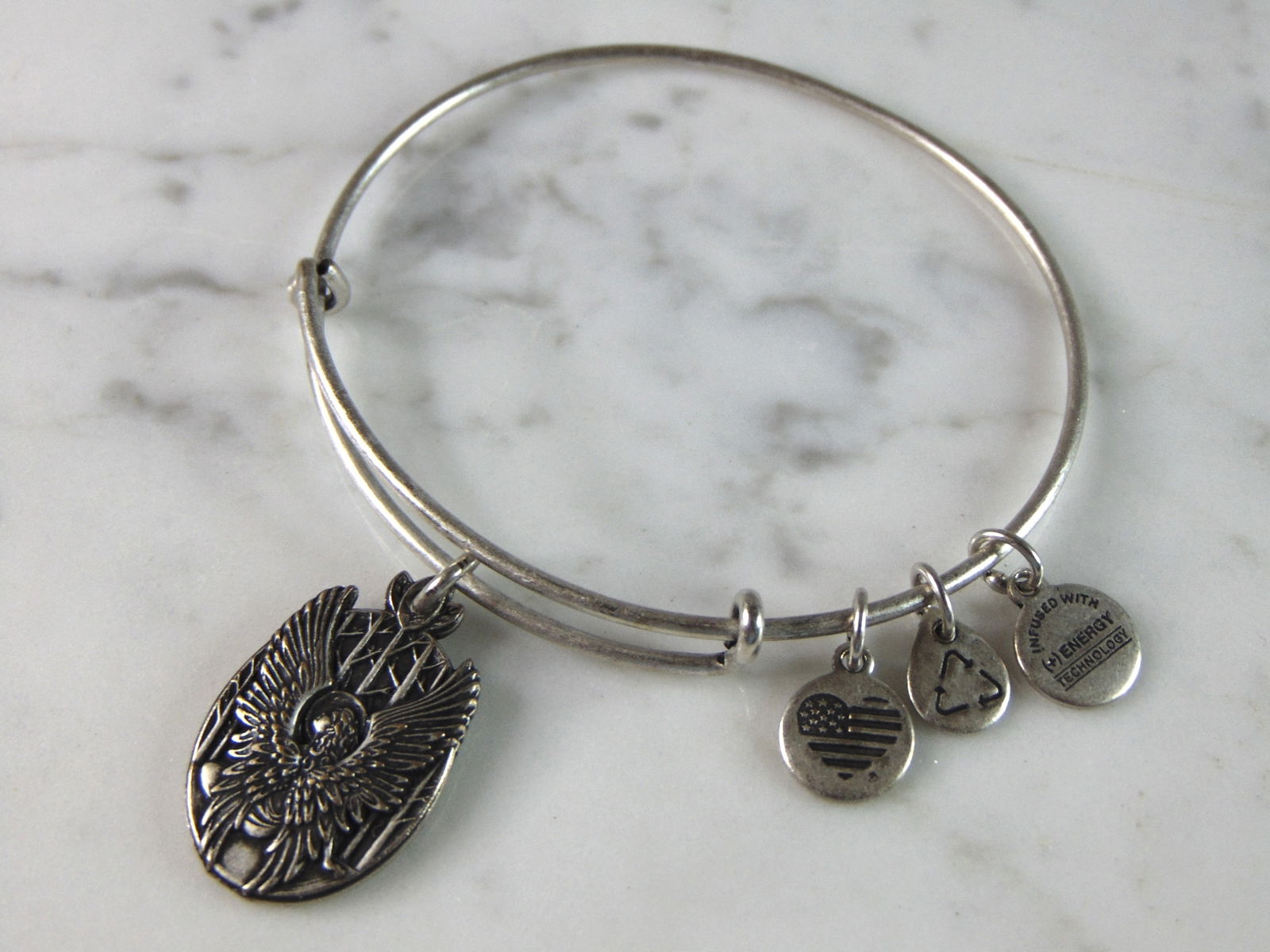Womens Vintage Estate Alex & Ani Charm Bracelet: FOR SALE IS A LOVELY VINTAGE ESTATE ALEX AND ANI GUARDIAN OF LOVE CHARM BRACELET, THAT WEIGHS 12.6g. THE BRACELET IS EXPANDABLE FROM ABOUT 2" TO 3.5". ANY QUESTIONS PLEASE DO NOT HESITATE TO ASK. BE S